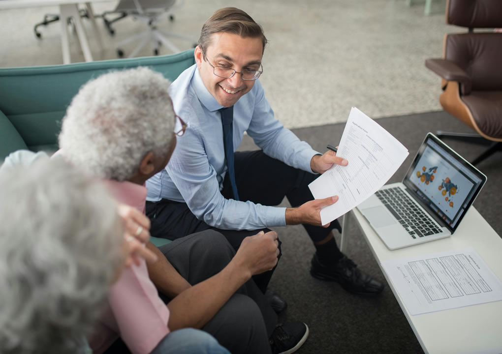 Solar power consultant explaining to clients